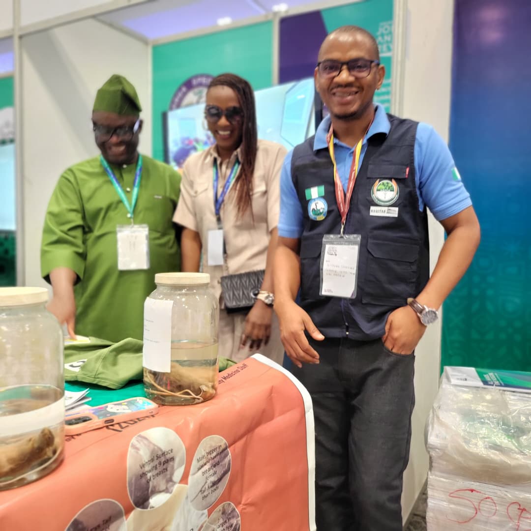 IVEPCR team at the Joint Annual Review exhibition booth