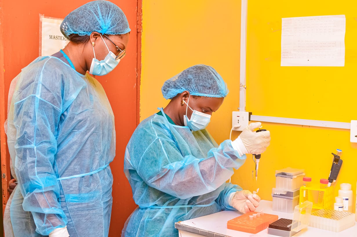 Bench scientists preparing reagents in the molecular lab