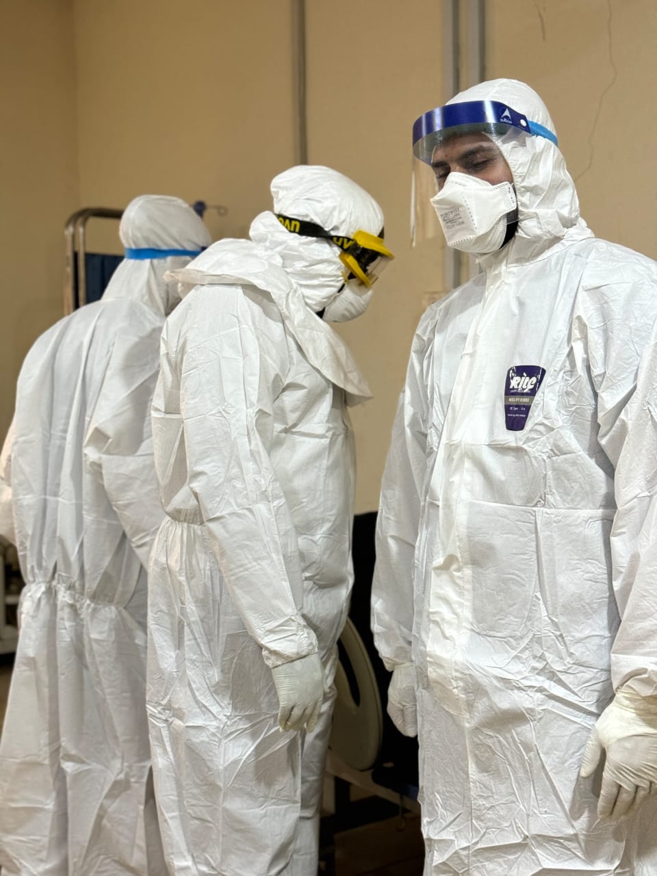 Response team checking PPE integrity before entering the isolation ward