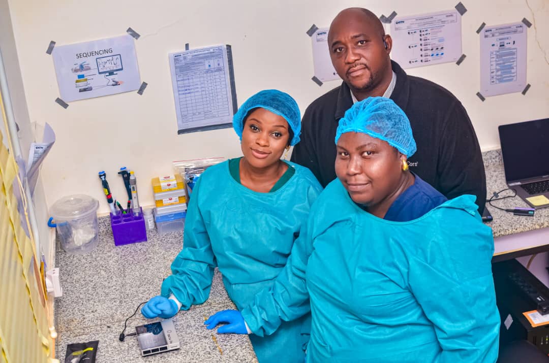 Sequencing team at the genomics workstation